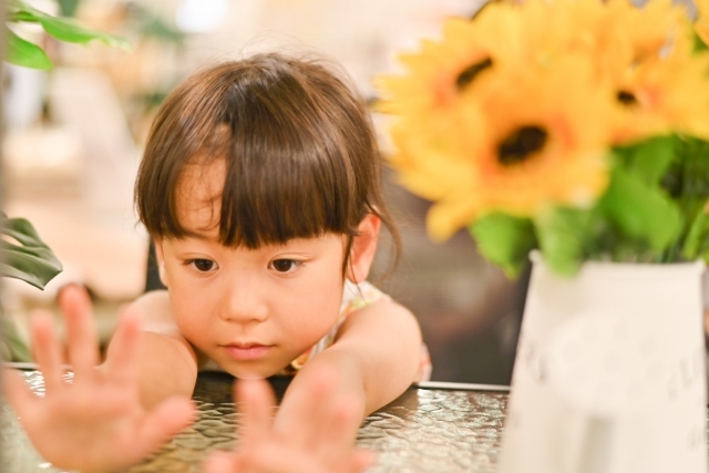 具合の悪い子供